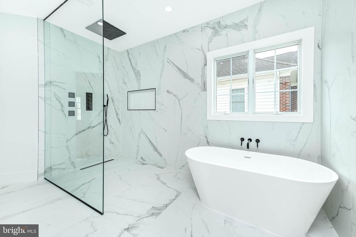 Bathroom, Free Standing Baths, Glass Shower, Interior, Marble, Marble Walls, Recessed Lighting