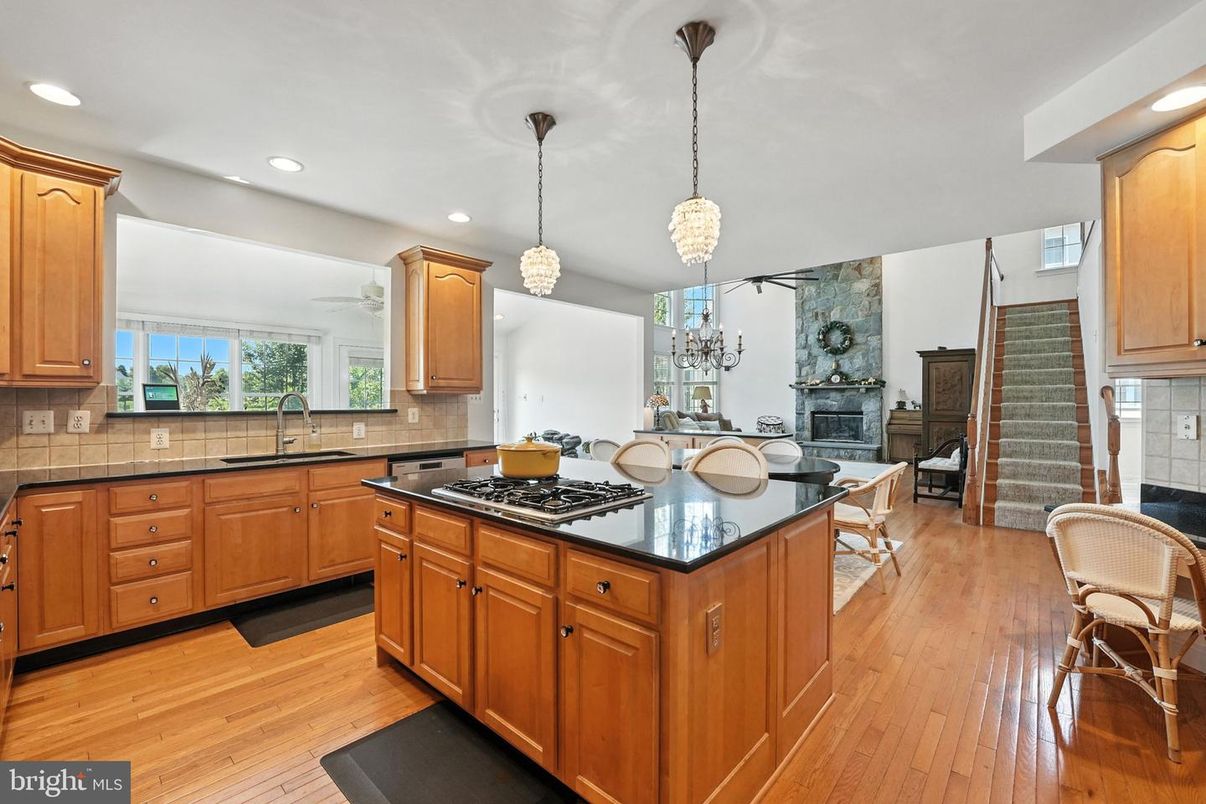 Dining room, Fireplace, Interior, Kitchen, Pendant Lights, Recessed Lighting, Wood Texture Flooring