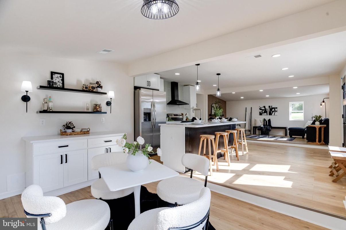 Dining room, Interior, Kitchen, Pendant Lights, Recessed Lighting, Stainless Steel Appliances, Wood Texture Flooring
