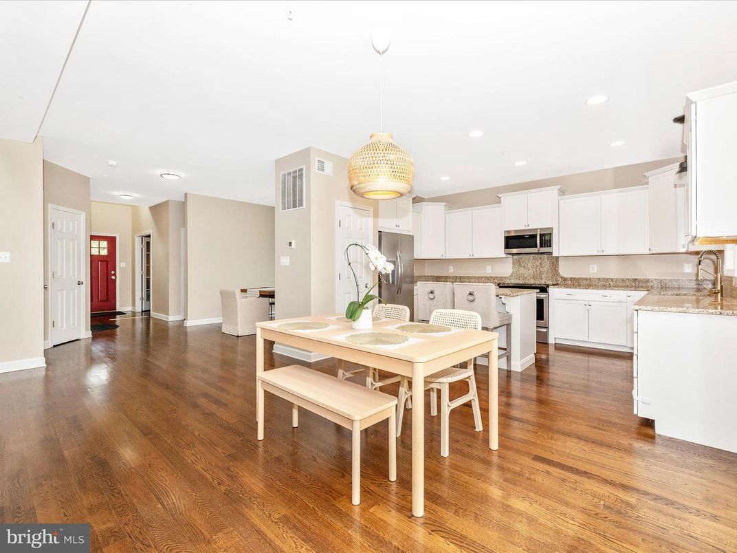 Dining room, Interior, Kitchen, Pendant Lights, Recessed Lighting, Stainless Steel Appliances, Wood Texture Flooring