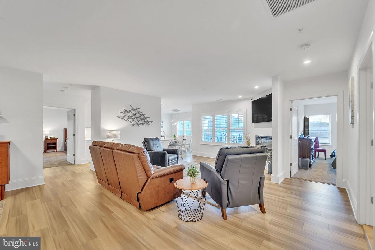 Fireplace, Interior, Living room, Recessed Lighting, Water, Wood Texture Flooring
