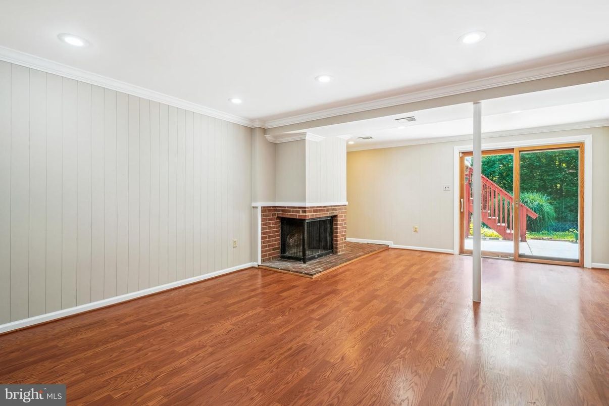 Empty room, Fireplace, Interior, Recessed Lighting, Wood Texture Flooring