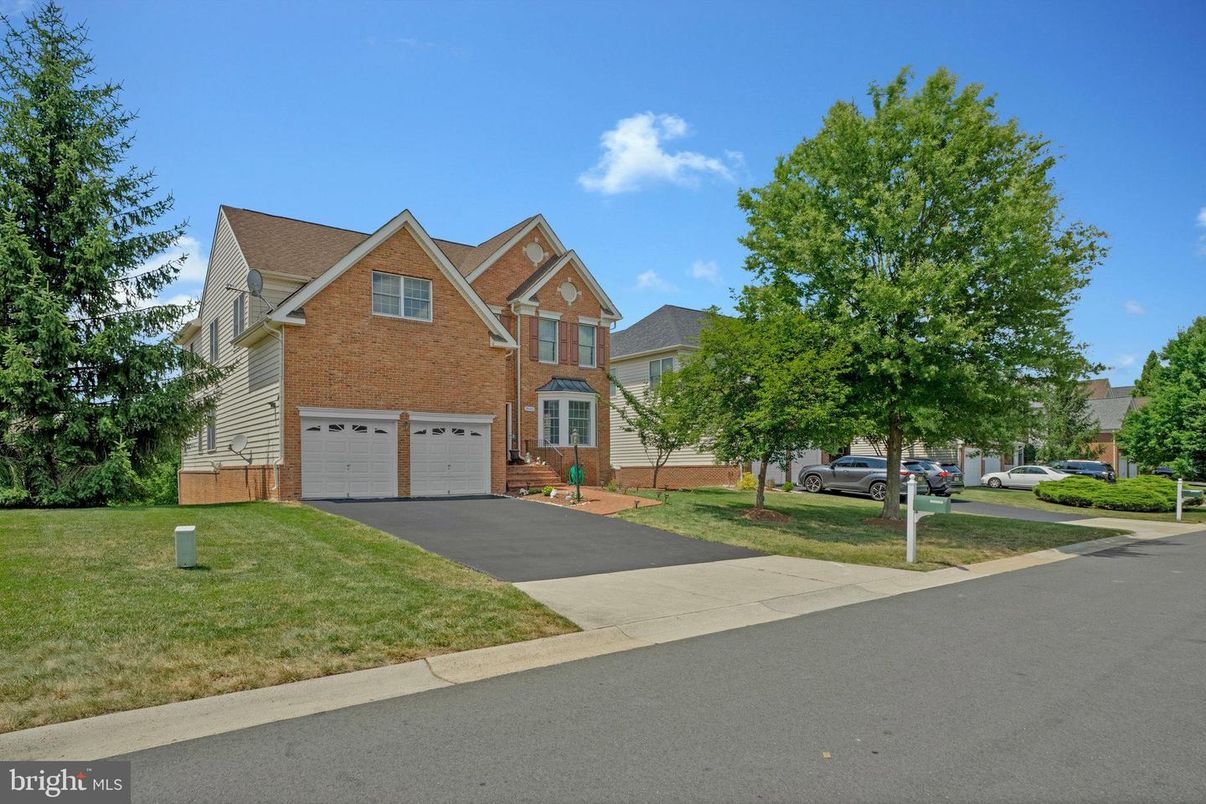 Attached, Exterior, Facade, Brick Facade, Tudor Revival