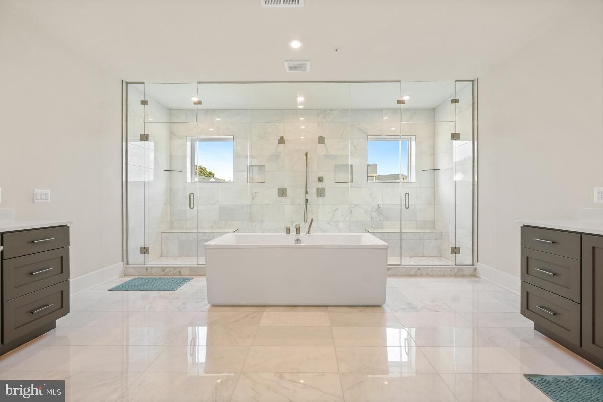 Bathroom, Free Standing Baths, Glass Shower, Interior, Marble, Marble Walls, Recessed Lighting