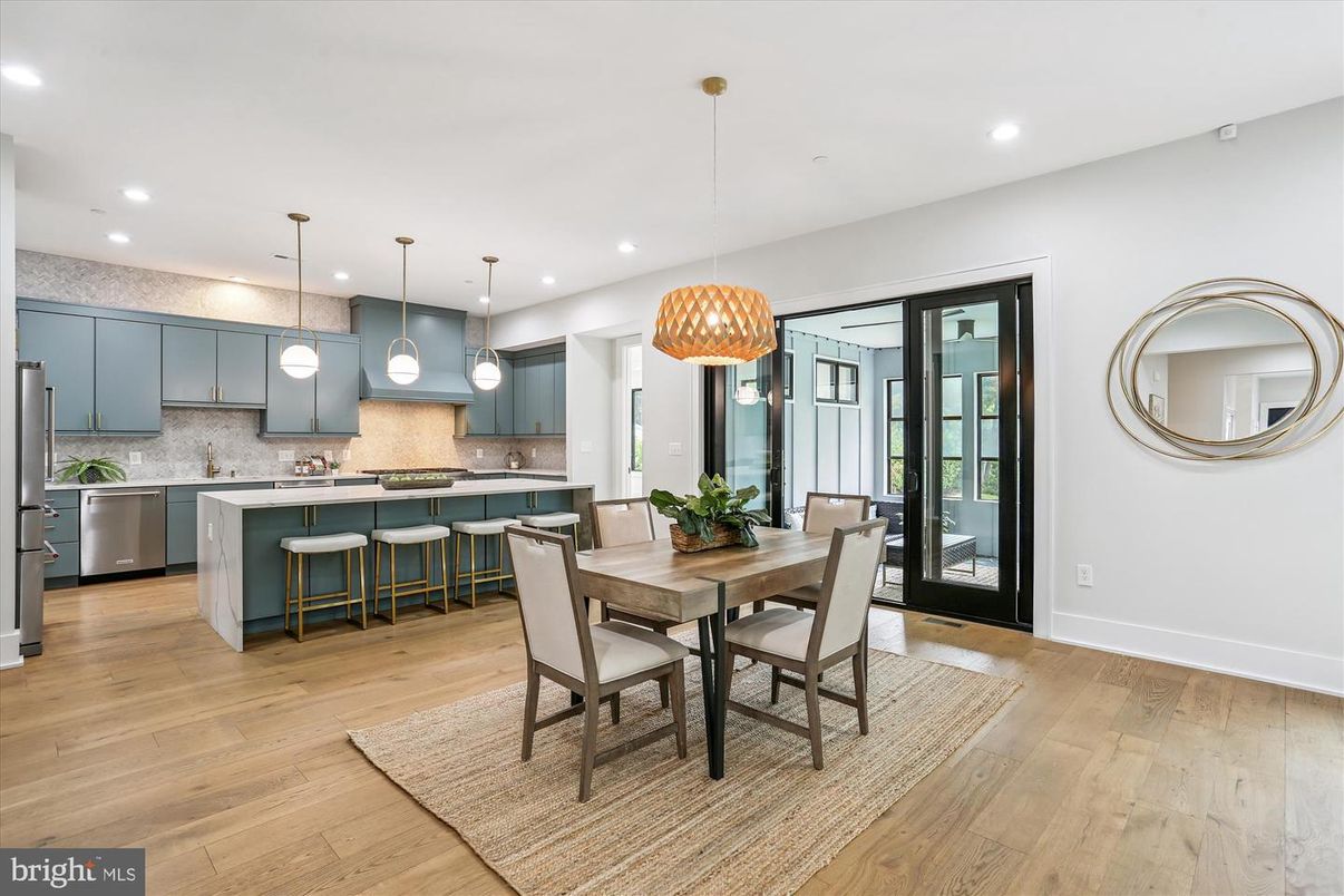 Dining room, Interior, Kitchen, Pendant Lights, Recessed Lighting, Stainless Steel Appliances, Wood Texture Flooring