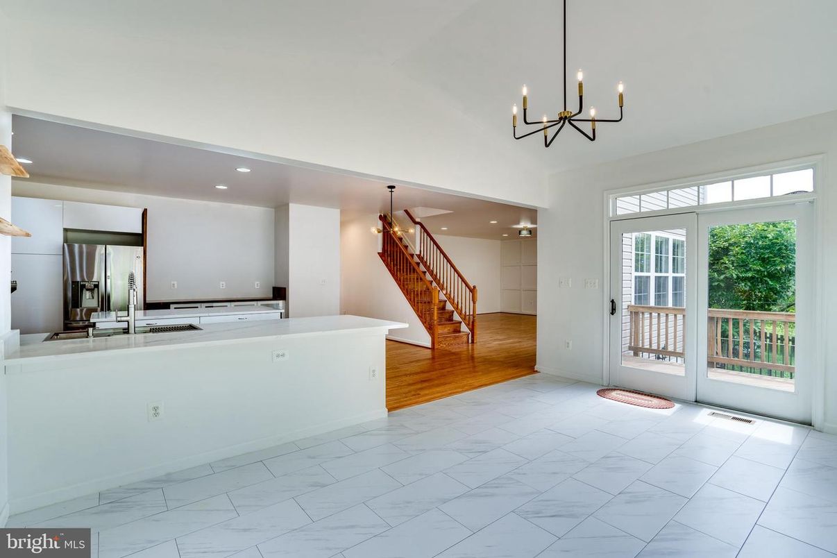 Chandelier, Interior, Kitchen, Marble, Pendant Lights, Recessed Lighting, Stainless Steel Appliances, Wood Texture Flooring