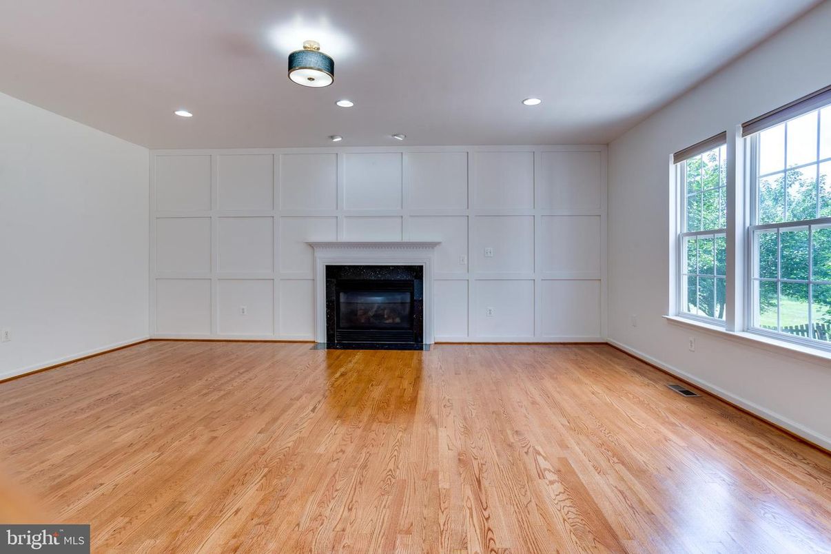 Empty room, Fireplace, Interior, Recessed Lighting, Wood Texture Flooring