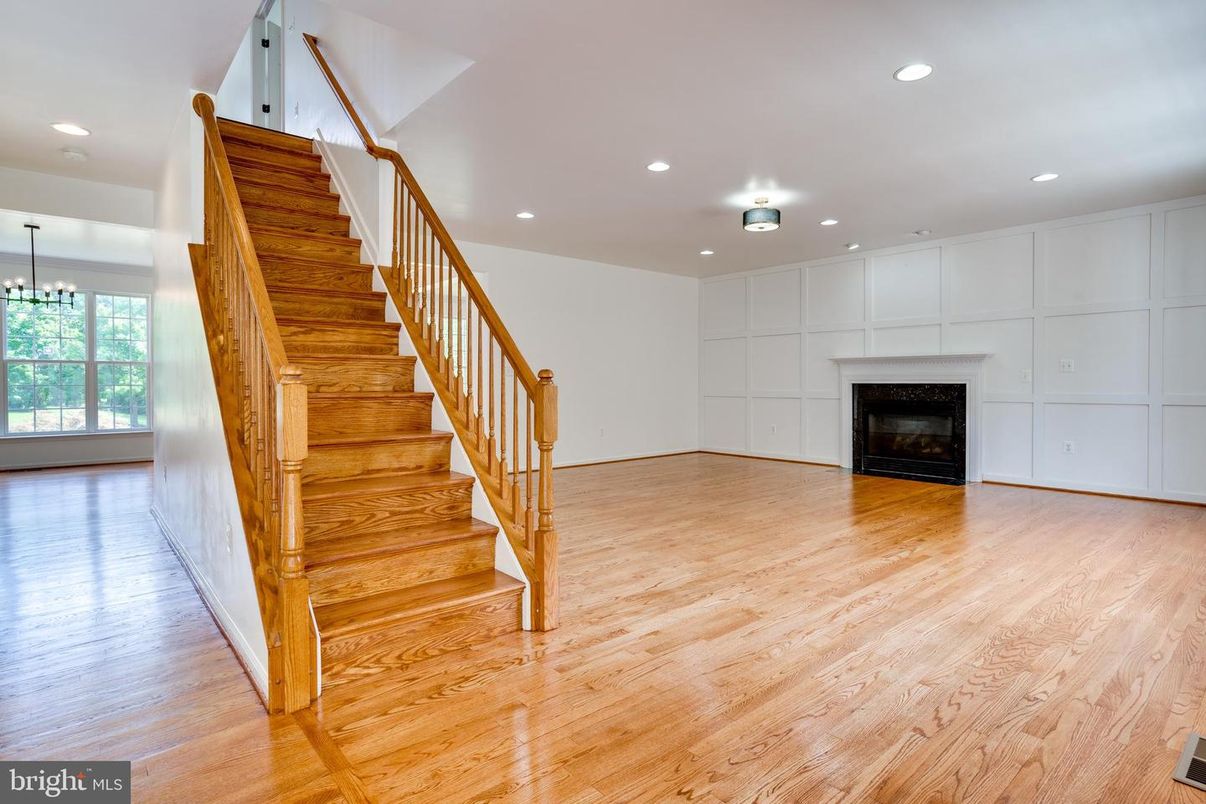 Empty room, Fireplace, Interior, Recessed Lighting, Wood Texture Flooring