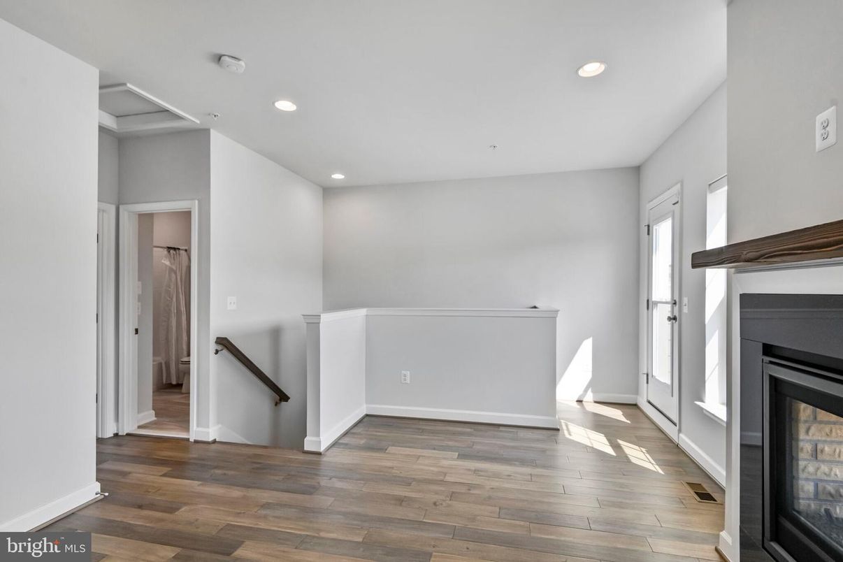 Empty room, Fireplace, Interior, Recessed Lighting, Wood Texture Flooring