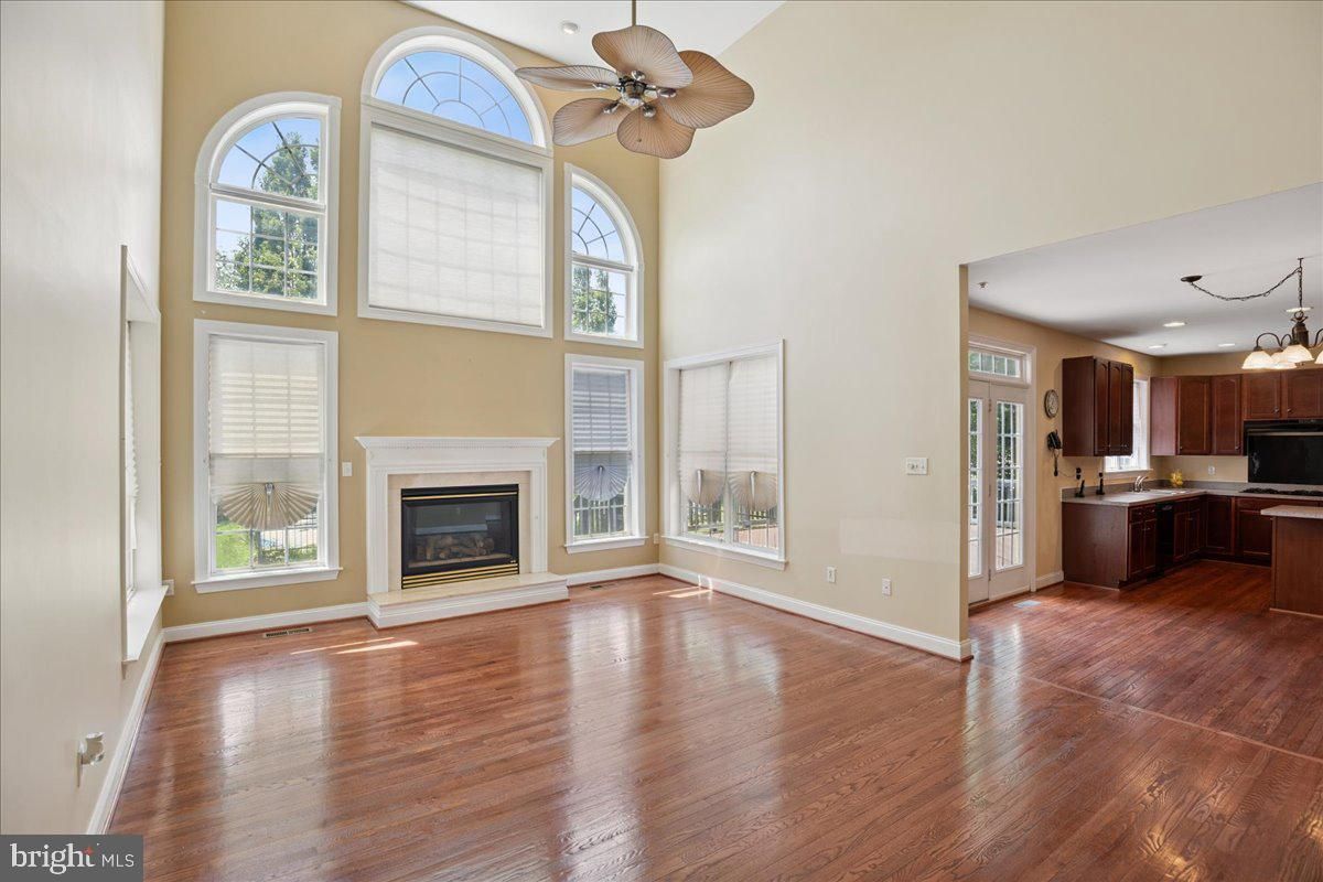 Chandelier, Empty room, Fireplace, Interior, Kitchen, Wood Texture Flooring