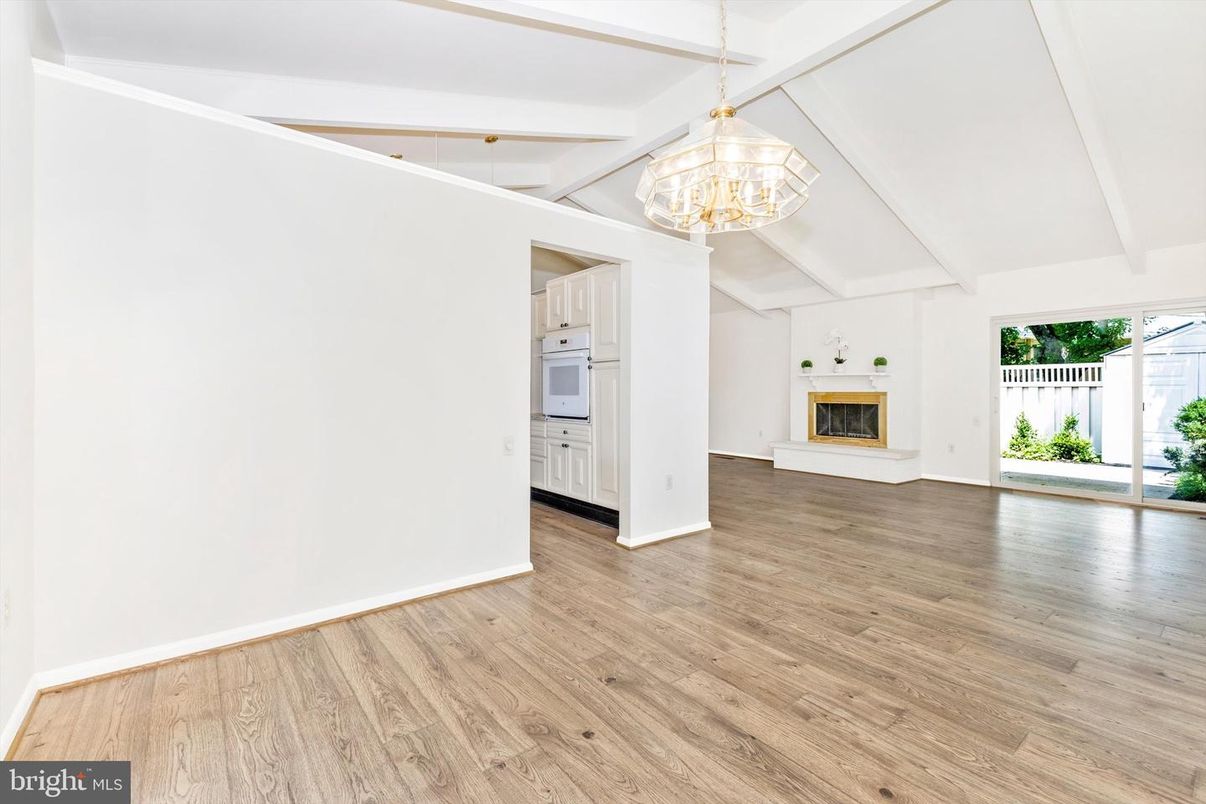 Chandelier, Empty room, Fireplace, Interior, Wood Texture Flooring