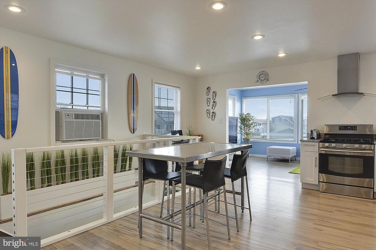 Dining room, Interior, Kitchen, Recessed Lighting, Stainless Steel Appliances, Wood Texture Flooring