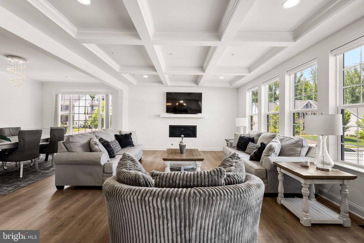 Dining room, Fireplace, Interior, Living room, Recessed Lighting, Wood Texture Flooring