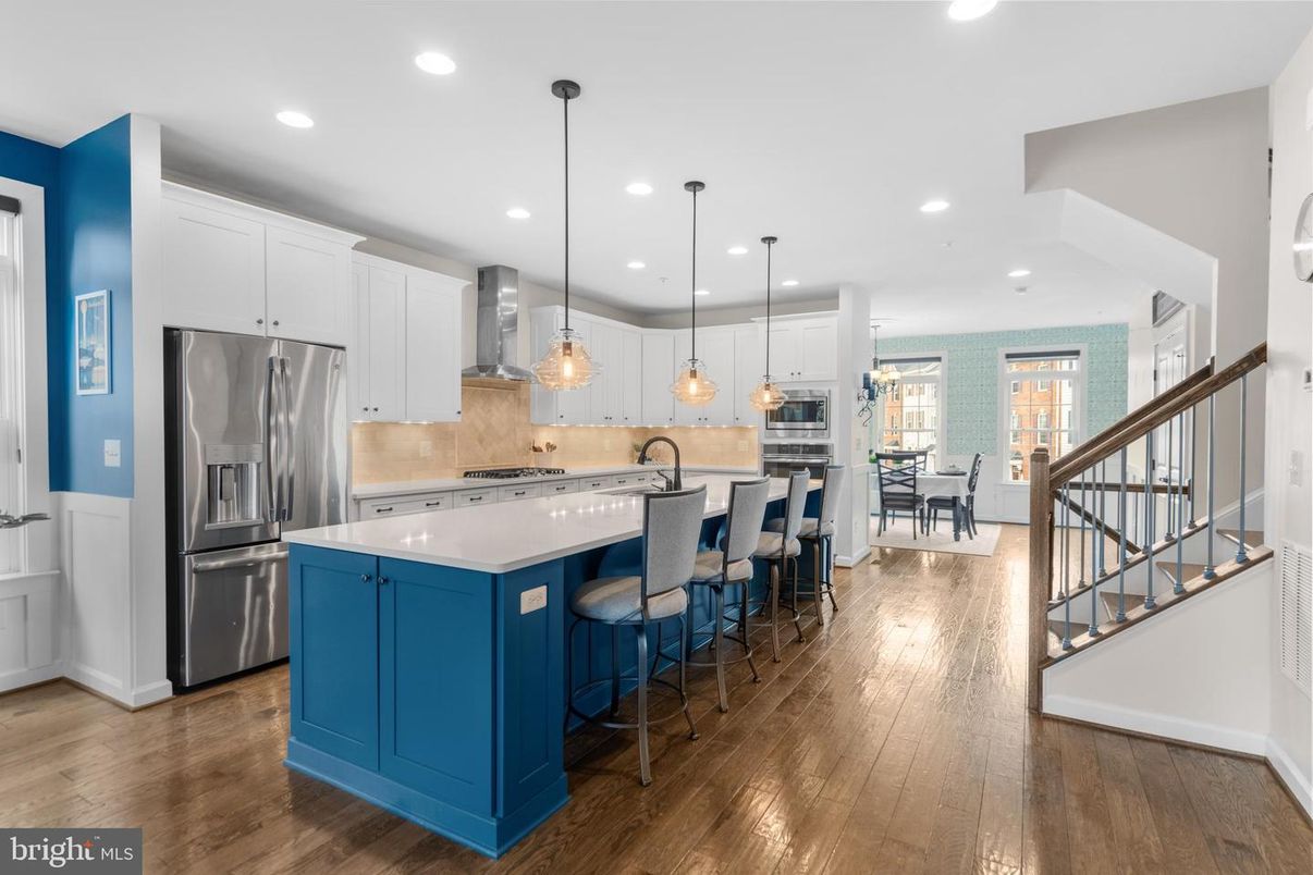 Dining room, Interior, Kitchen, Pendant Lights, Recessed Lighting, Stainless Steel Appliances, Wood Texture Flooring