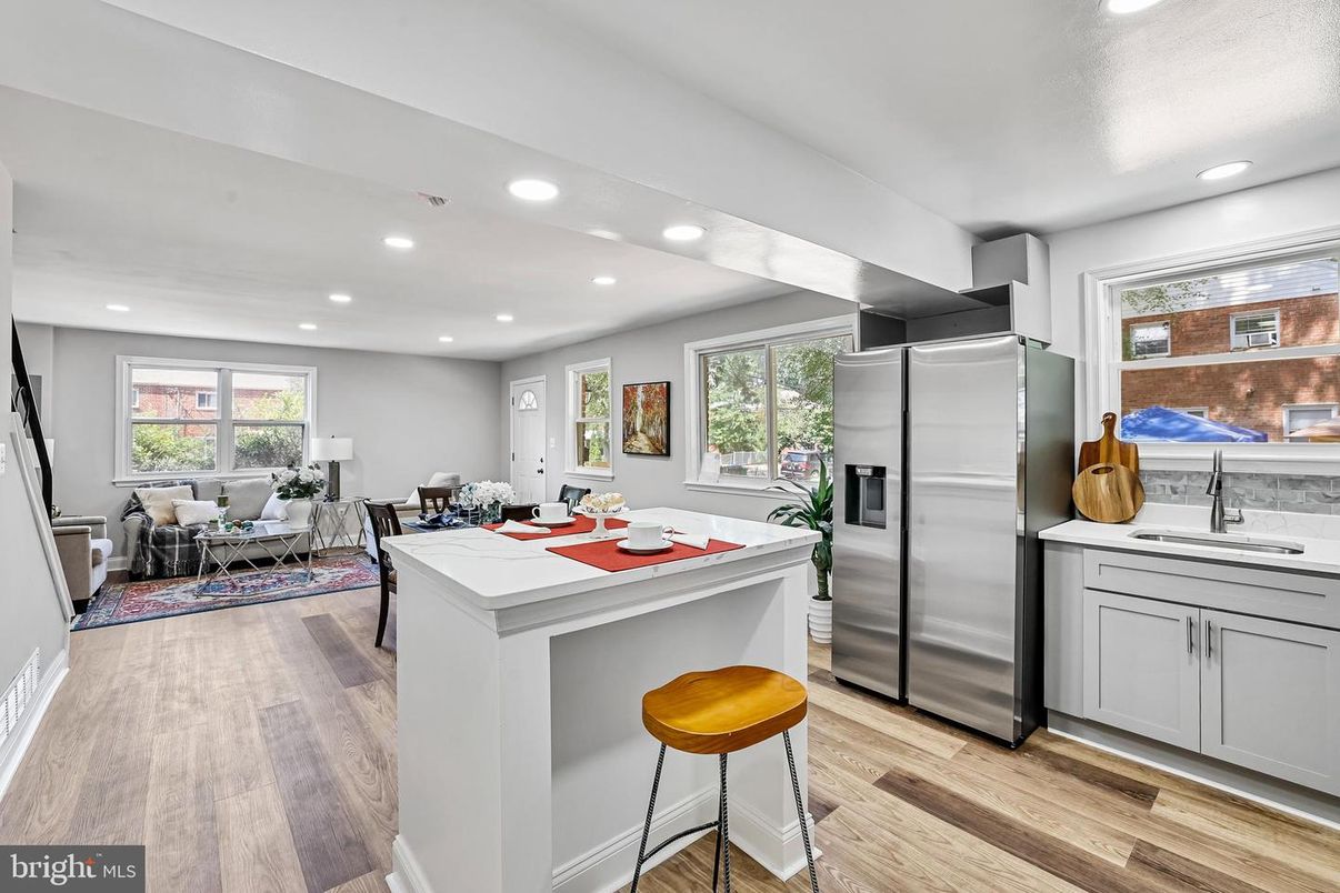 Dining room, Interior, Kitchen, Living room, Recessed Lighting, Stainless Steel Appliances, Wood Texture Flooring