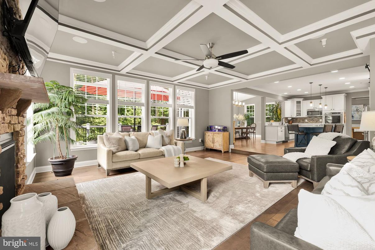 Fireplace, Interior, Kitchen, Living room, Pendant Lights, Recessed Lighting, Stainless Steel Appliances, Wood Texture Flooring