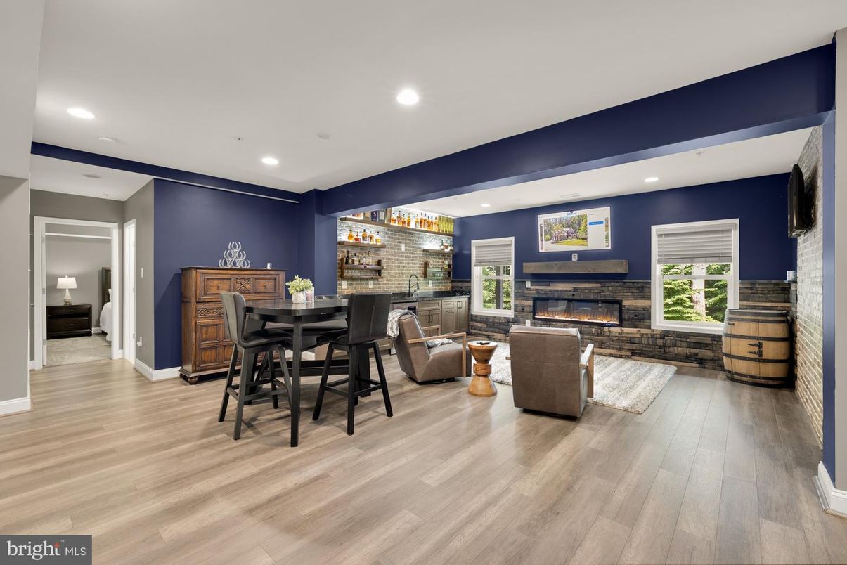 Dining room, Fireplace, Interior, Living room, Recessed Lighting, Wood Texture Flooring