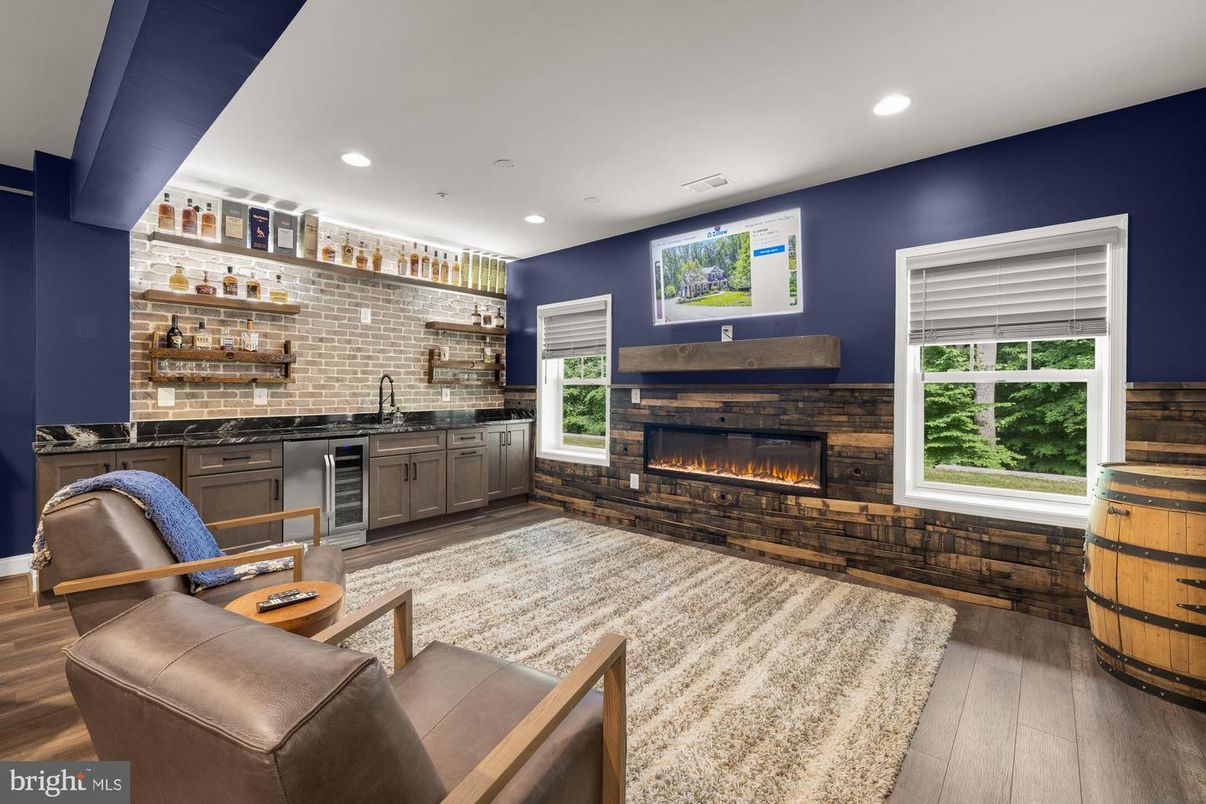 Fireplace, Interior, Living room, Recessed Lighting, Stone Walls, Wood Texture Flooring