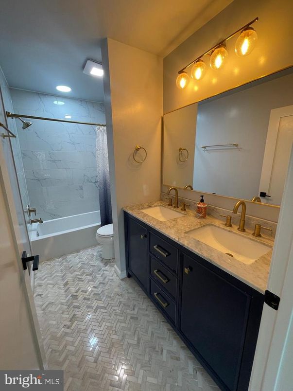 Bathroom, Dual Sink Vanities, Interior, Marble Walls, Recessed Lighting