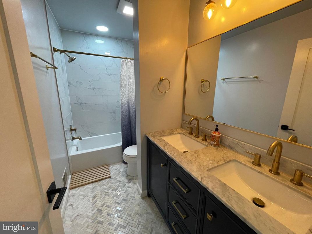 Bathroom, Dual Sink Vanities, Interior, Marble Walls, Recessed Lighting