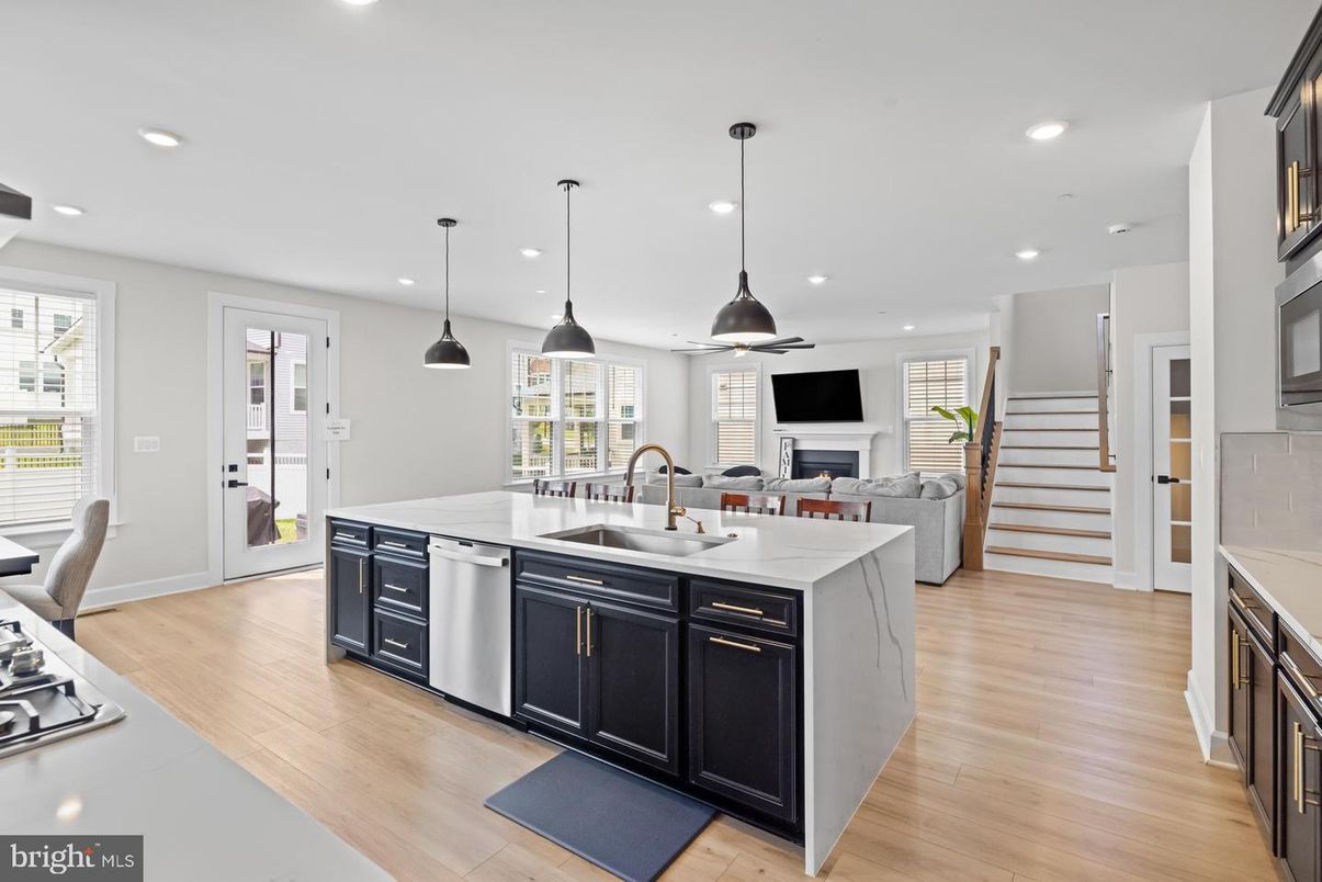 Fireplace, Interior, Kitchen, Pendant Lights, Recessed Lighting, Stainless Steel Appliances, Wood Texture Flooring