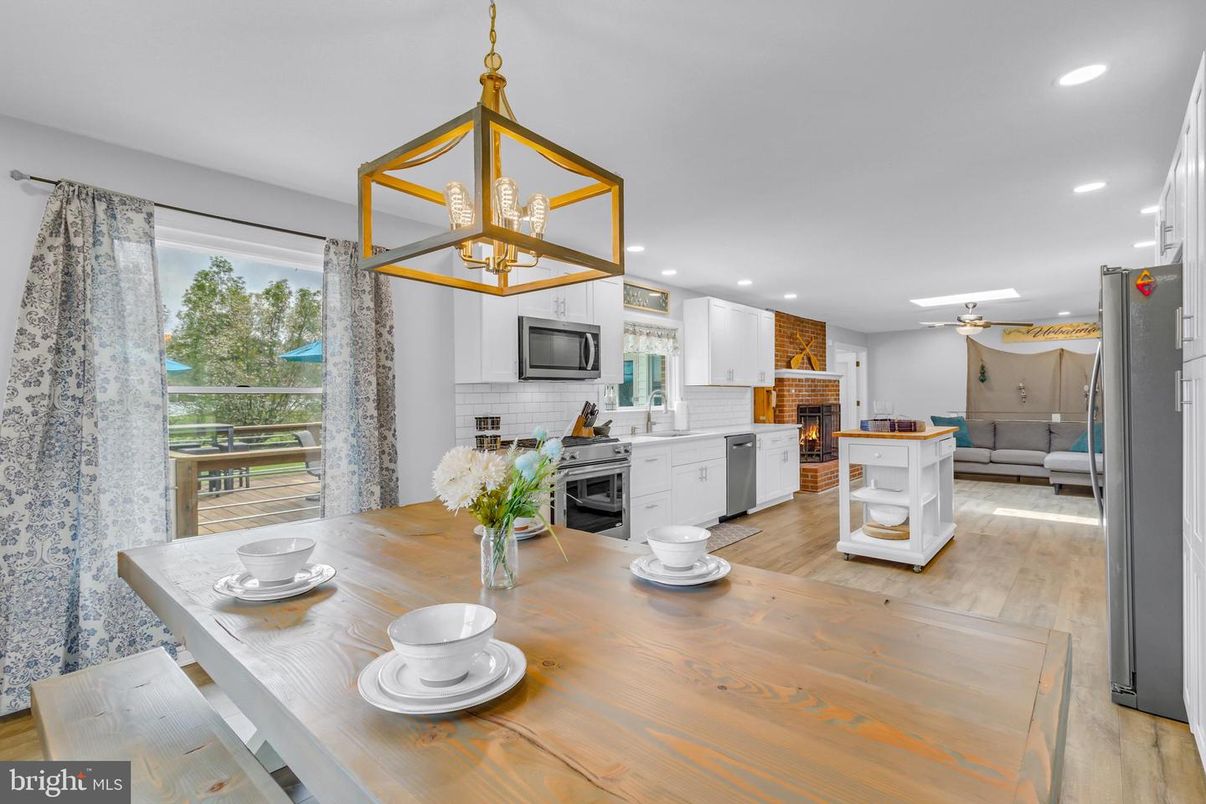 Dining room, Fireplace, Interior, Kitchen, Pendant Lights, Recessed Lighting, Wood Texture Flooring