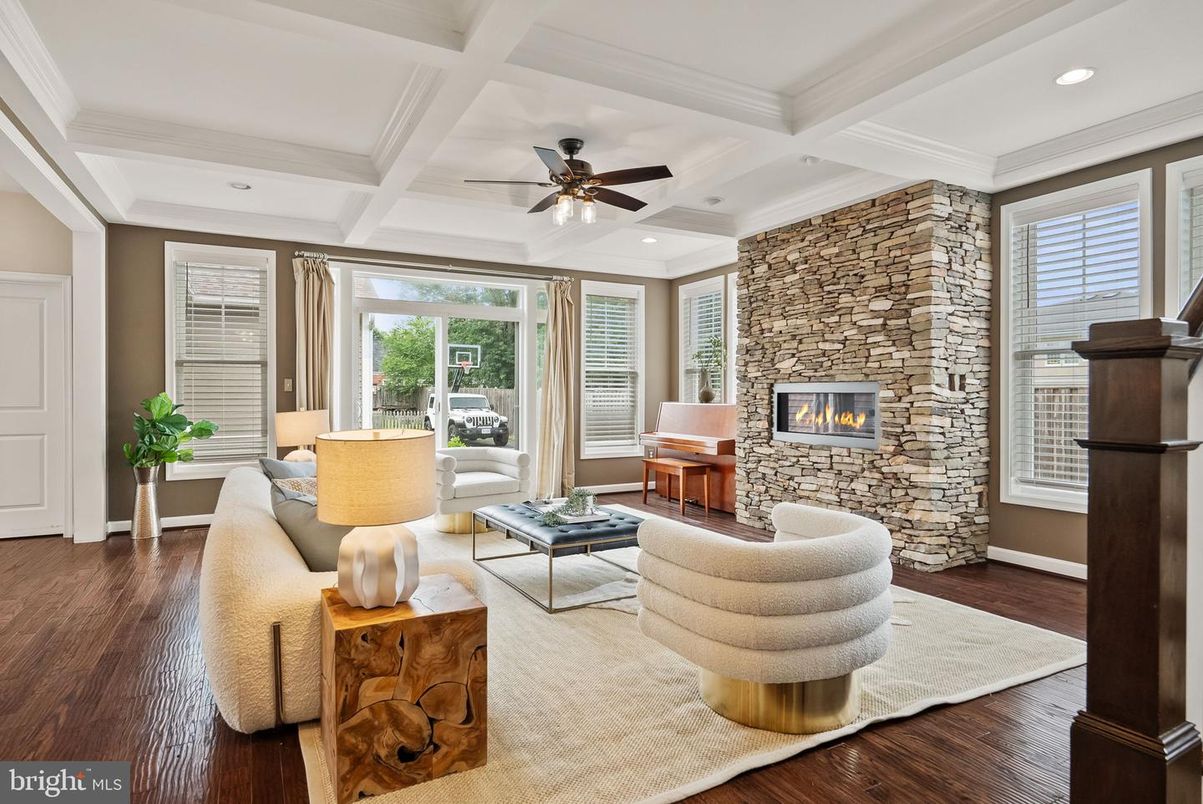 Fireplace, Interior, Living room, Recessed Lighting, Stone Walls, Wood Texture Flooring