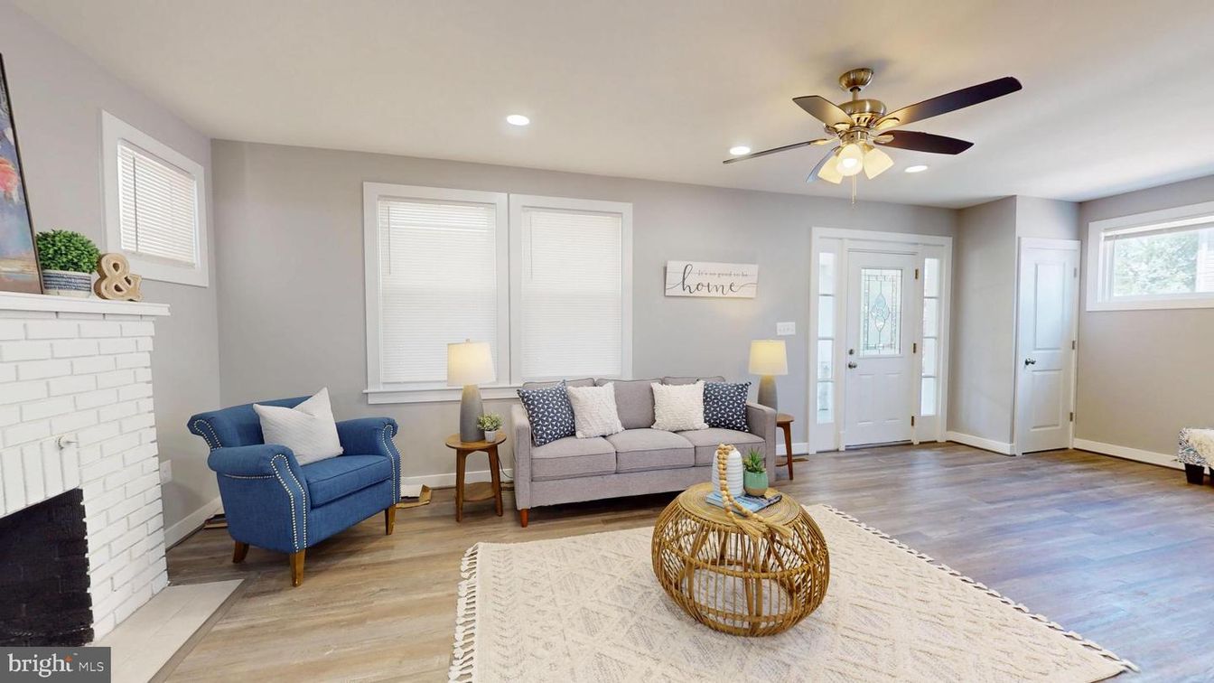 Fireplace, Interior, Living room, Recessed Lighting, Stone Walls, Wood Texture Flooring