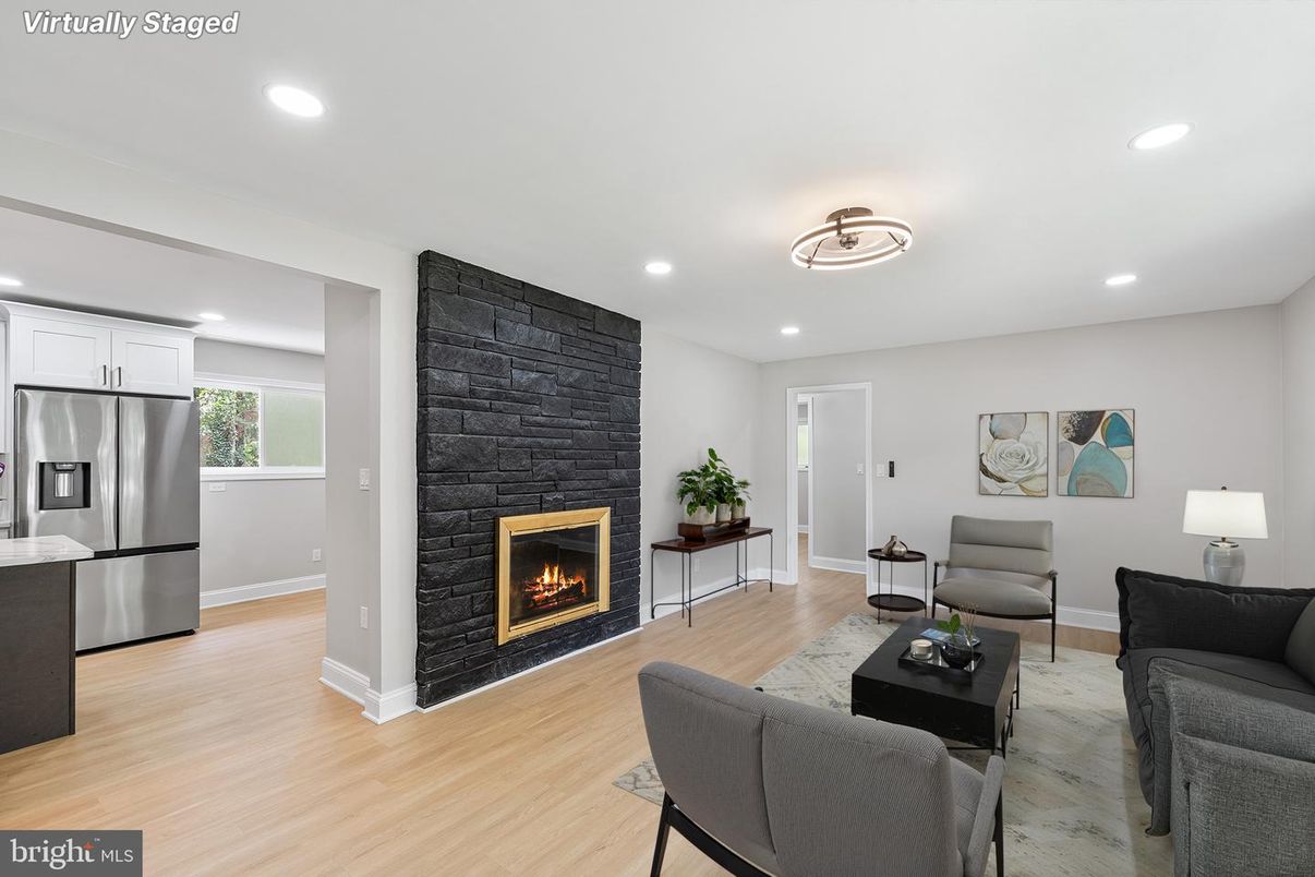 Fireplace, Interior, Kitchen, Living room, Recessed Lighting, Stainless Steel Appliances, Wood Texture Flooring
