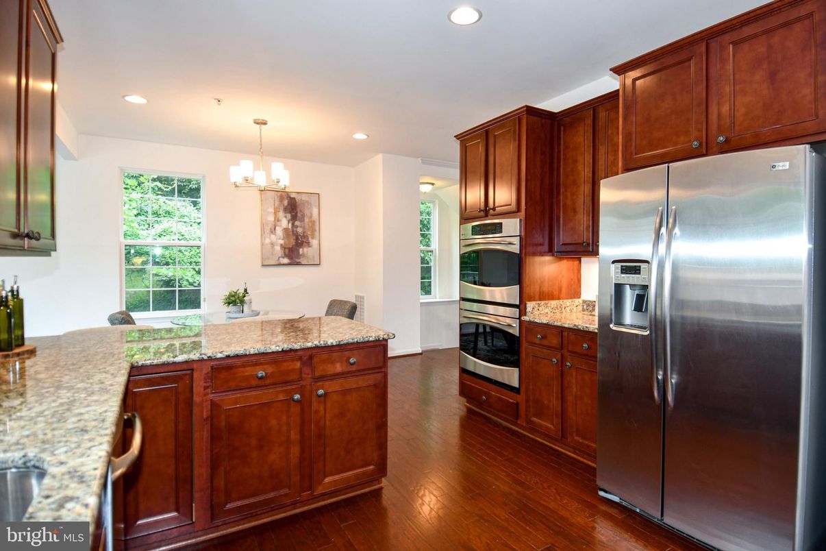 Chandelier, Interior, Kitchen, Pendant Lights, Recessed Lighting, Stainless Steel Appliances, Wood Texture Flooring