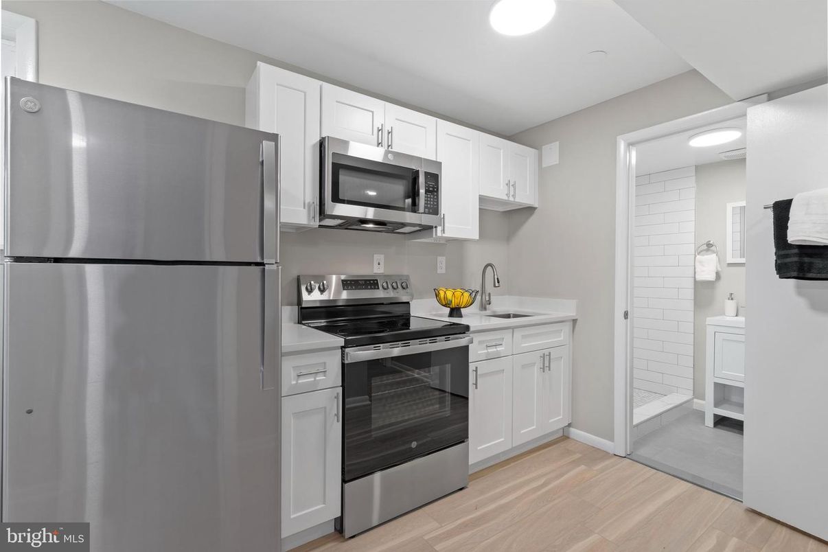 Interior, Kitchen, Recessed Lighting, Stainless Steel Appliances, Wood Texture Flooring