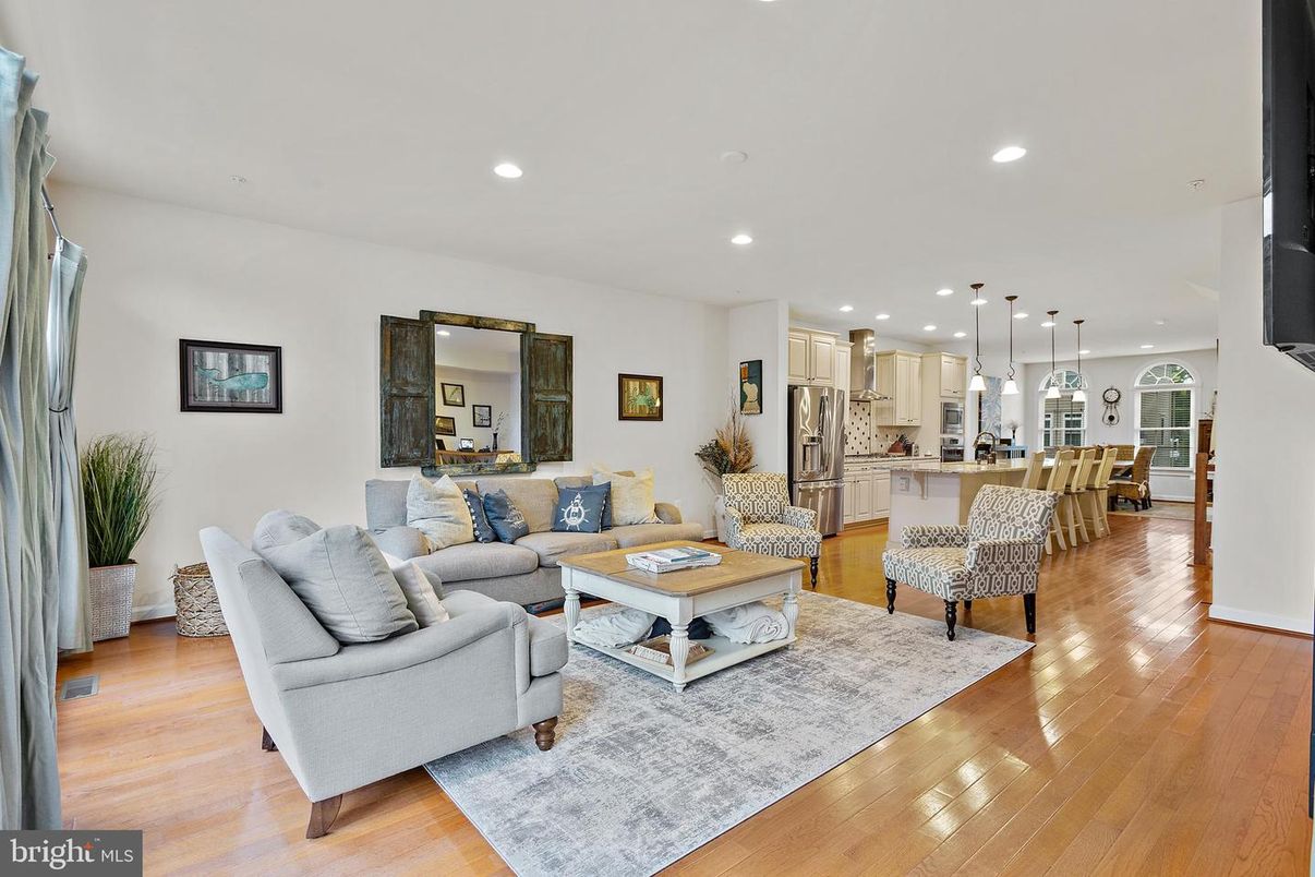 Dining room, Interior, Kitchen, Living room, Pendant Lights, Recessed Lighting, Stainless Steel Appliances, Wood Texture Flooring