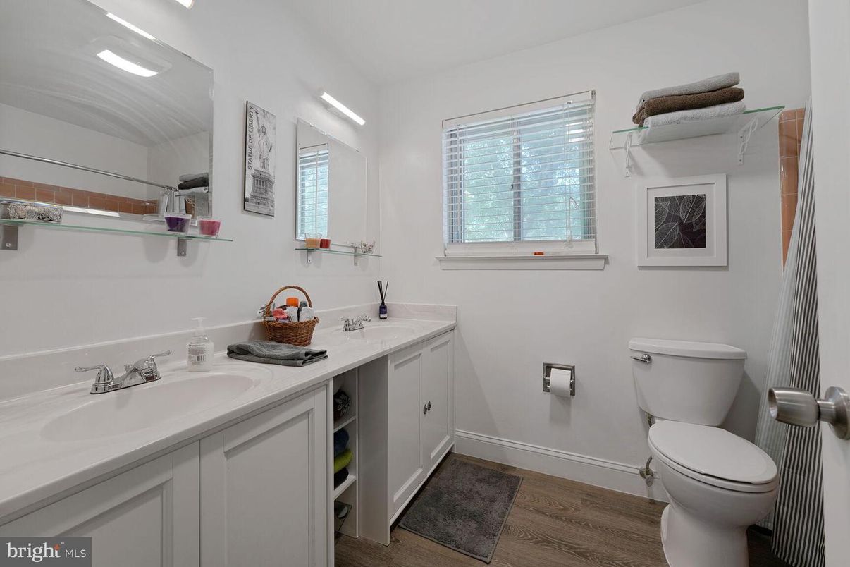 Bathroom, Dual Sink Vanities, Interior, Recessed Lighting, Wood Texture Flooring