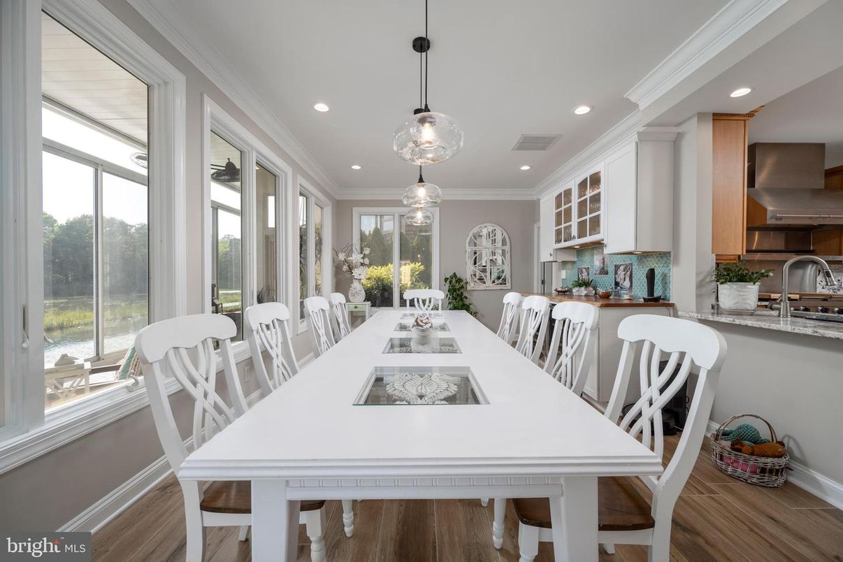 Dining room, Interior, Kitchen, Pendant Lights, Recessed Lighting, Stainless Steel Appliances, Wood Texture Flooring