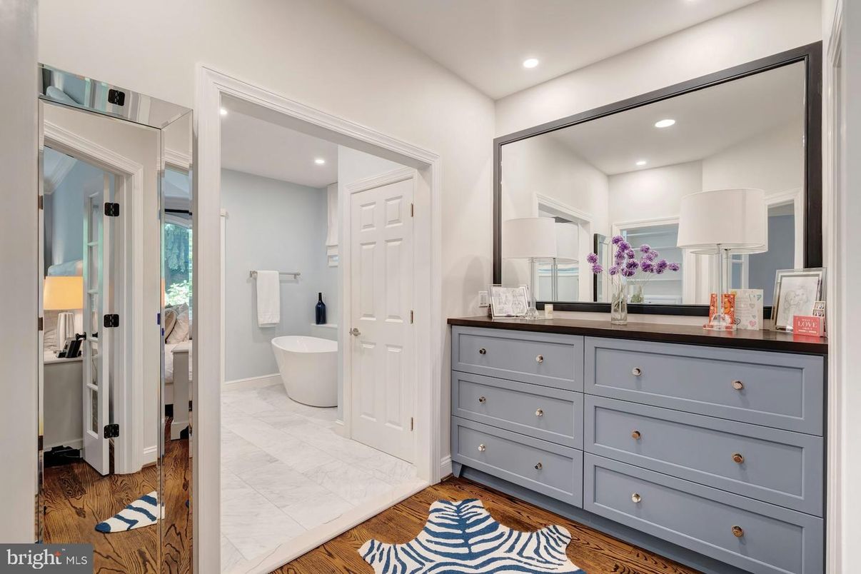 Bathroom, Dual Sink Vanities, Free Standing Baths, Interior, Marble, Recessed Lighting, Wood Texture Flooring