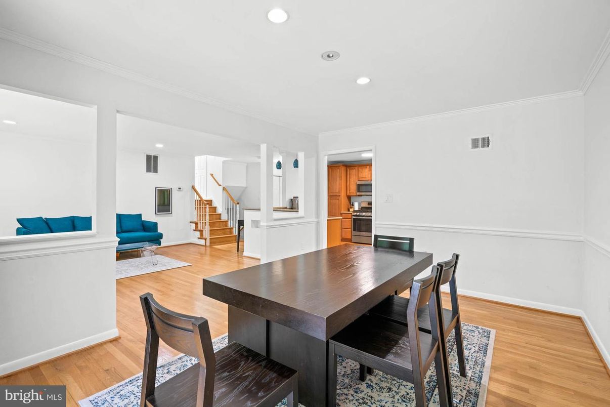 Dining room, Interior, Kitchen, Living room, Recessed Lighting, Stainless Steel Appliances, Wood Texture Flooring
