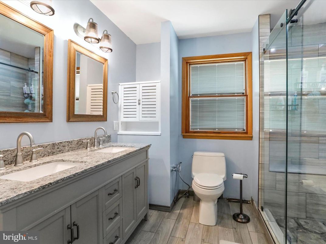 Bathroom, Dual Sink Vanities, Glass Shower, Interior, Wood Texture Flooring