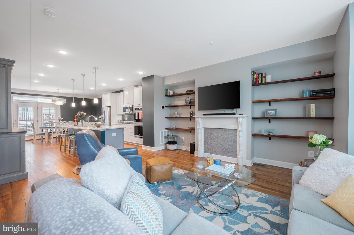 Dining room, Fireplace, Interior, Kitchen, Living room, Pendant Lights, Recessed Lighting, Stainless Steel Appliances, Wood Texture Flooring