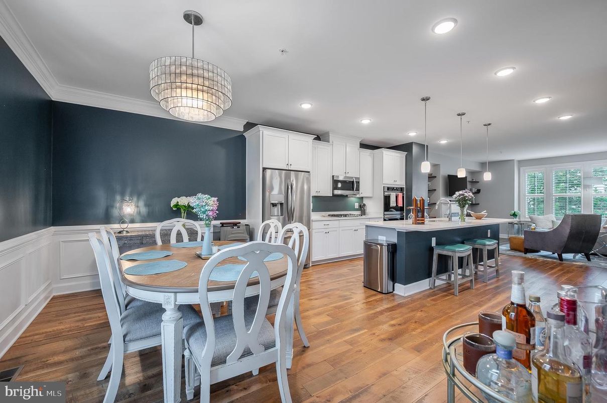 Dining room, Interior, Kitchen, Pendant Lights, Recessed Lighting, Stainless Steel Appliances, Wood Texture Flooring