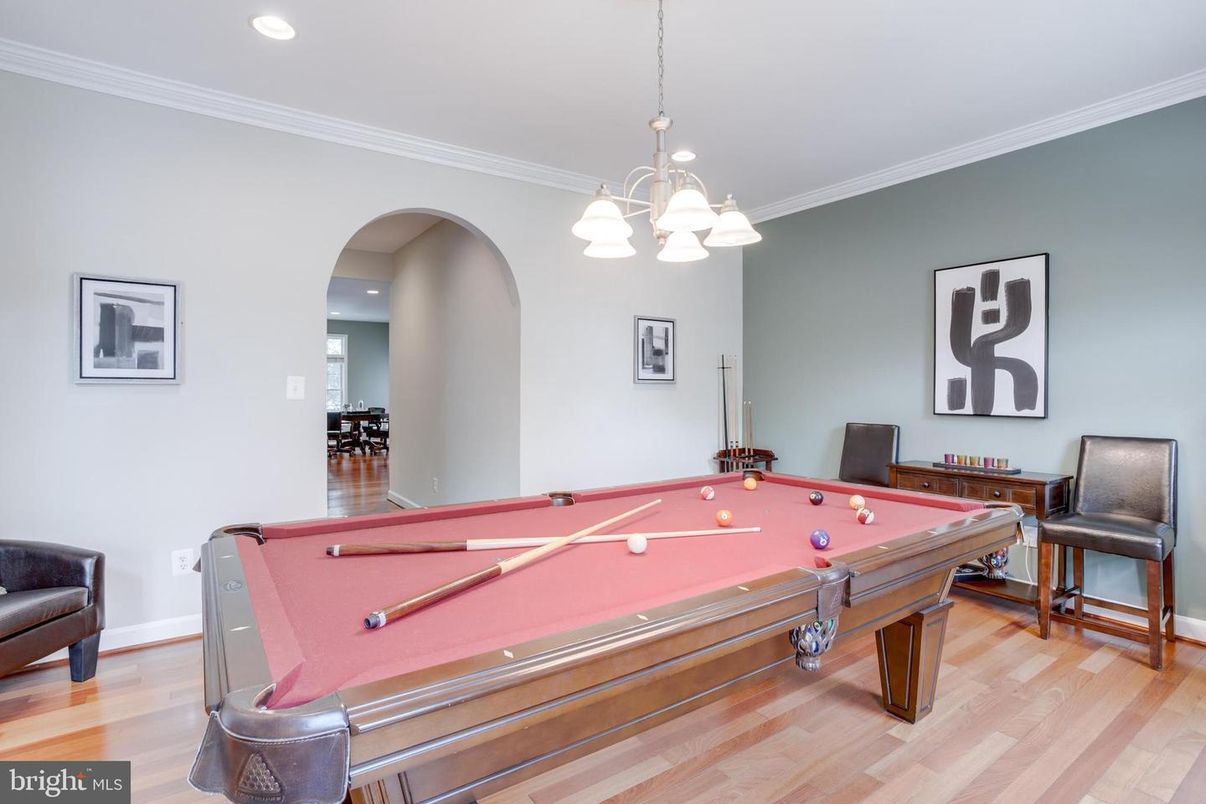 Billiard Table, Chandelier, Game Room, Interior, Pendant Lights, Recessed Lighting, Wood Texture Flooring
