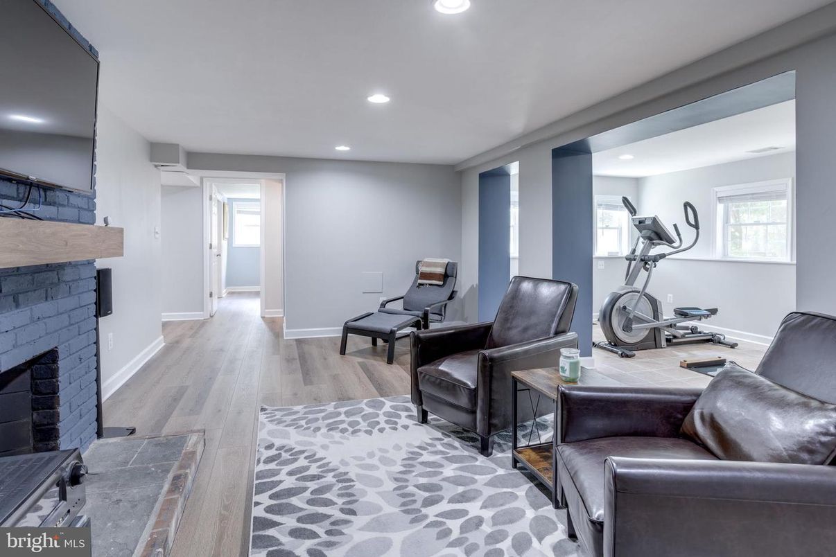Fireplace, Fitness Equipment, Interior, Recessed Lighting, Wood Texture Flooring