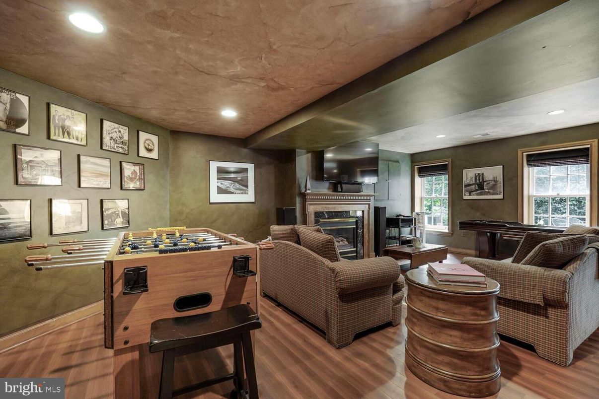 Fireplace, Game Room, Interior, Living room, Recessed Lighting, Wood Texture Flooring