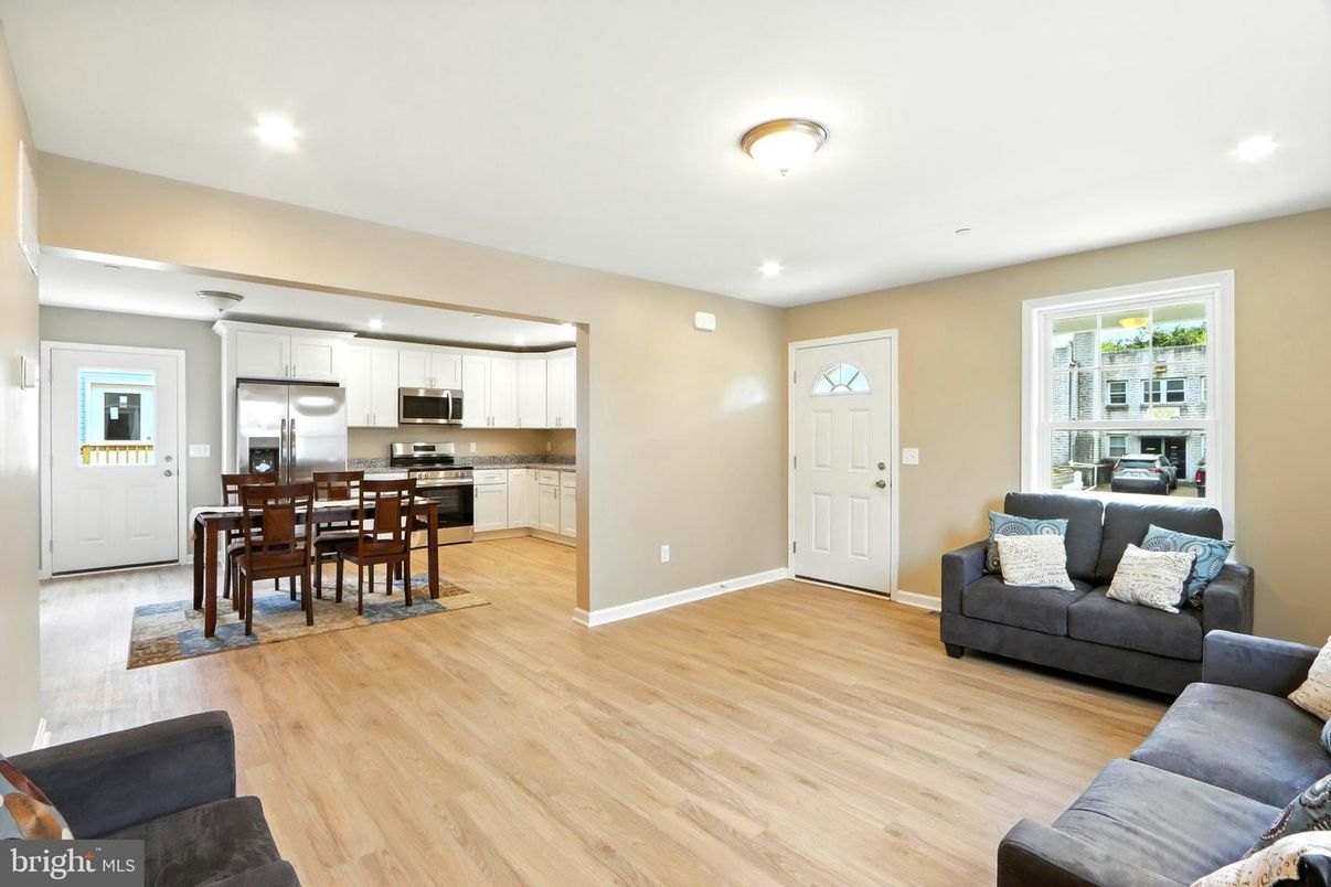 Dining room, Interior, Kitchen, Living room, Recessed Lighting, Stainless Steel Appliances, Wood Texture Flooring