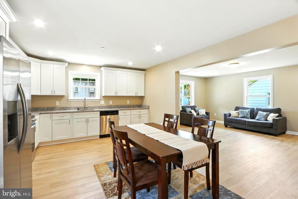 Dining room, Interior, Kitchen, Living room, Recessed Lighting, Stainless Steel Appliances, Wood Texture Flooring