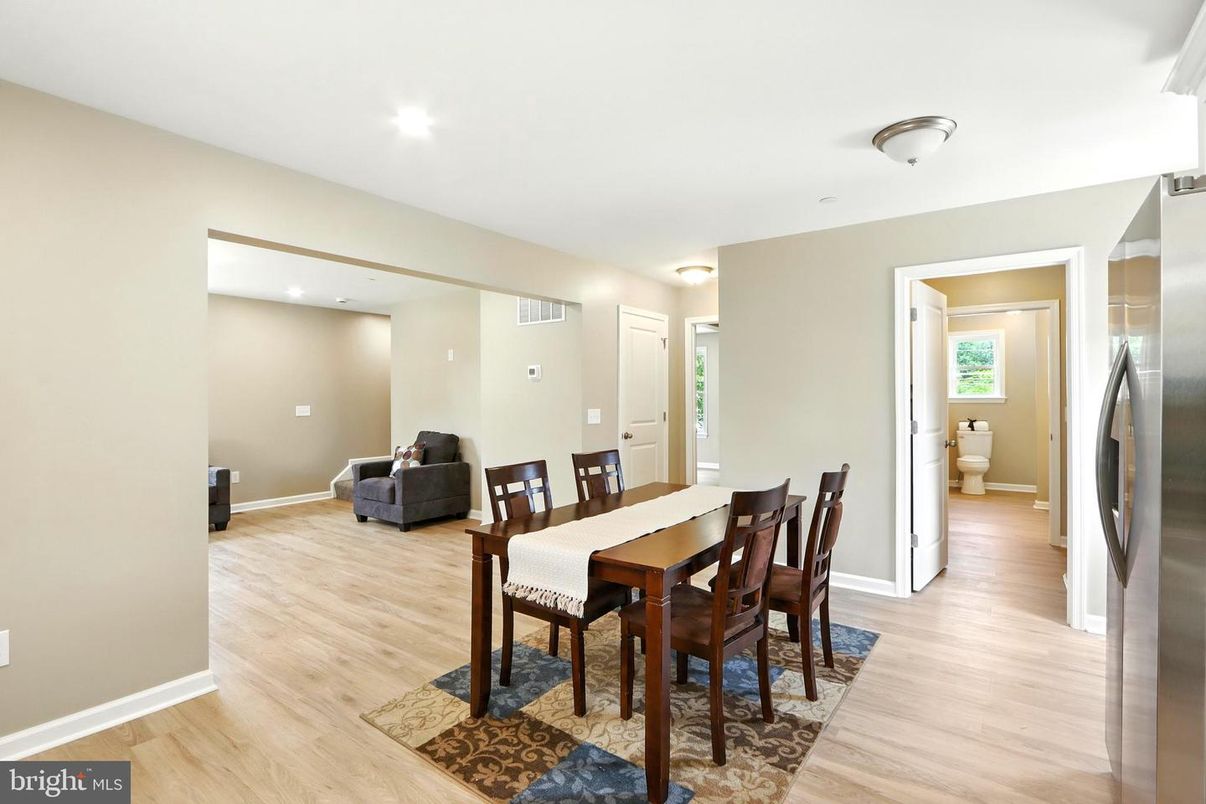 Dining room, Interior, Recessed Lighting, Stainless Steel Appliances, Wood Texture Flooring