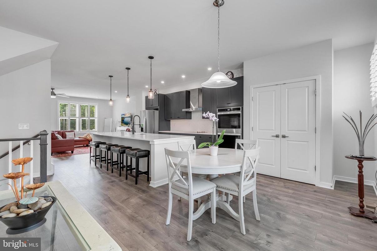 Dining room, Interior, Kitchen, Living room, Pendant Lights, Recessed Lighting, Stainless Steel Appliances, Wood Texture Flooring