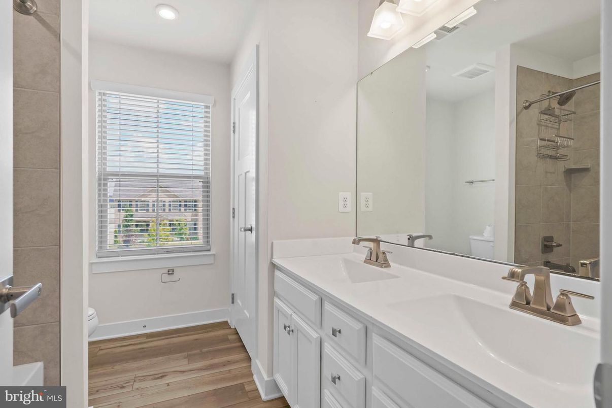 Bathroom, Dual Sink Vanities, Interior, Recessed Lighting, Wood Texture Flooring