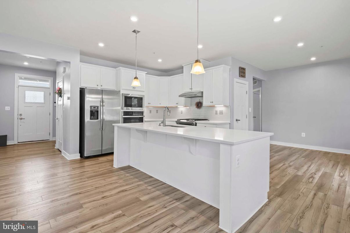 Interior, Kitchen, Pendant Lights, Recessed Lighting, Stainless Steel Appliances, Wood Texture Flooring