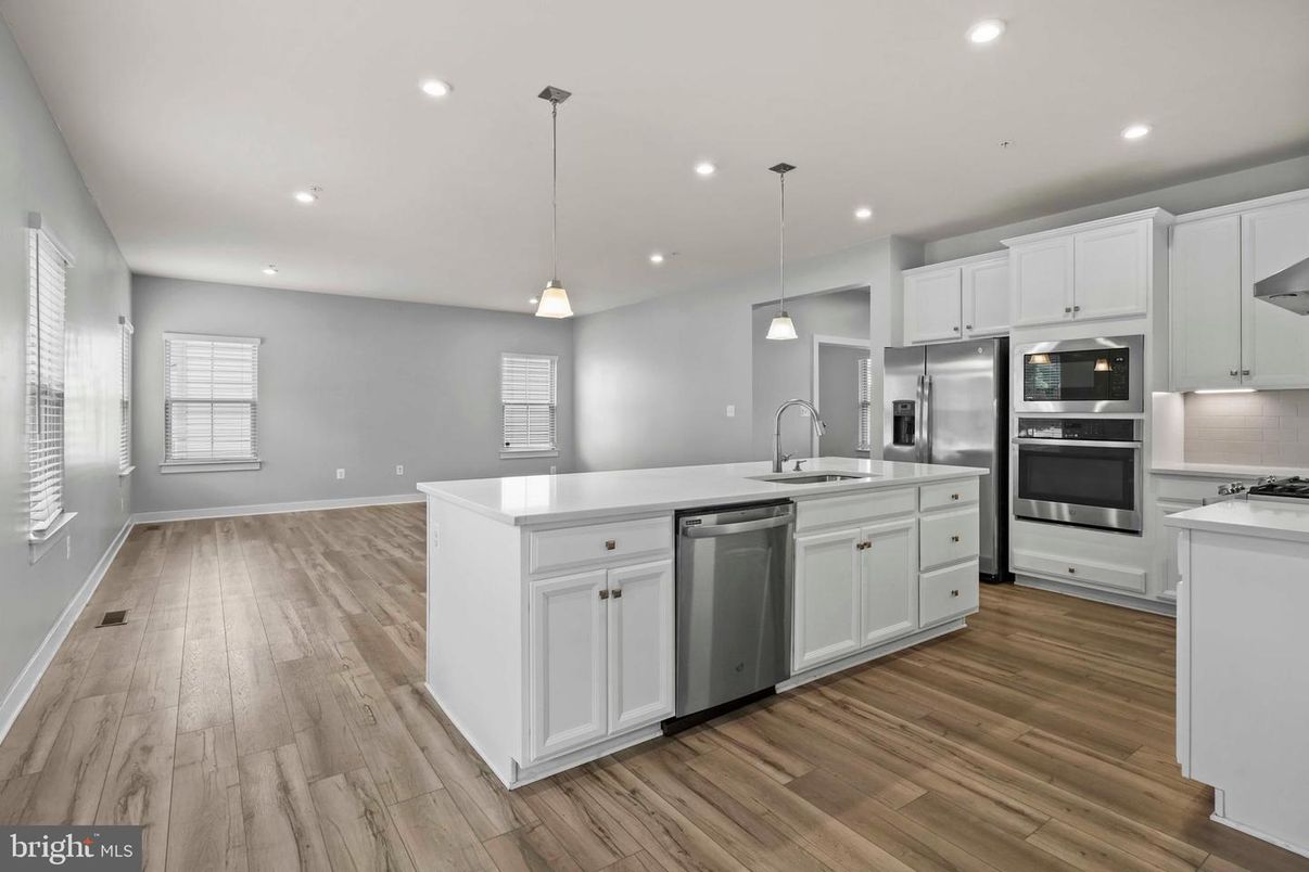 Interior, Kitchen, Pendant Lights, Recessed Lighting, Stainless Steel Appliances, Wood Texture Flooring