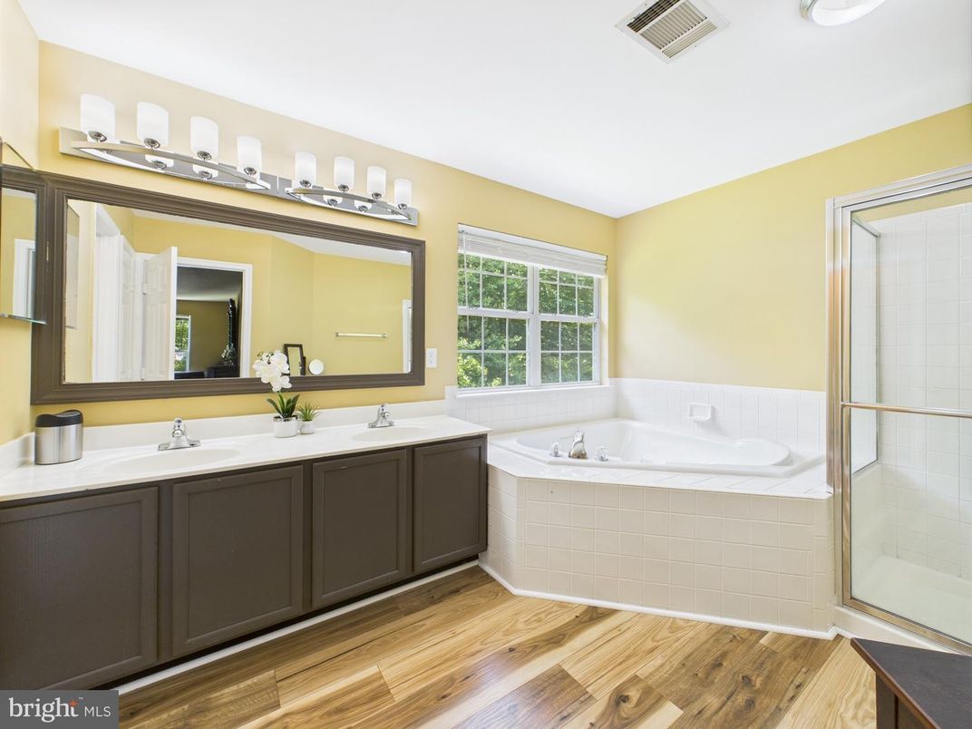 Bathroom, Dual Sink Vanities, Glass Shower, Interior, Wood Texture Flooring